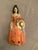 National Foundry antique doorstop of a young lady woman Southern Belle holding a hat and flower bouquet. Cast Iron with a...