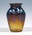 Mould blown, conically widening body on a flush round base, forming rounded shoulders, neck constriction with flared rim,...