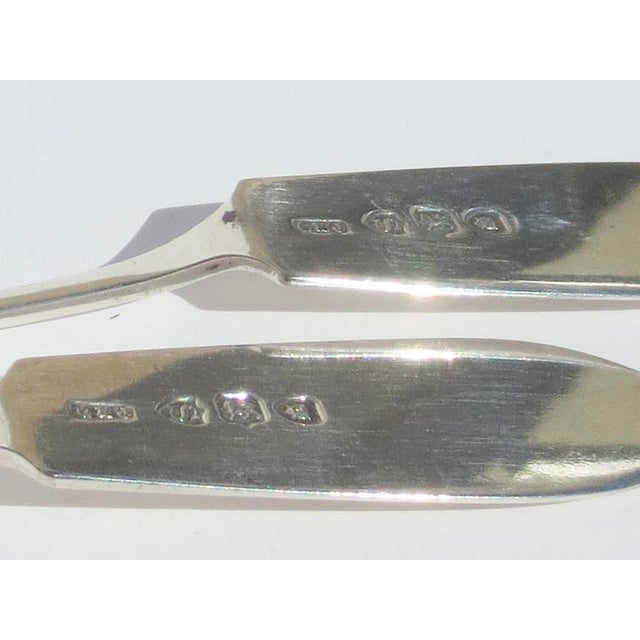 Sterling silver spreaders from Josiah Williams London 1895. Beautiful design on delicate handles with a great balance in...