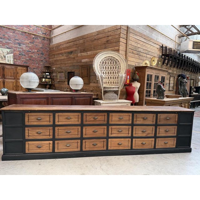 This authentic antique cabinet has been completely restored. It features 18 functional drawers. Dimensions: l39 x d40 x...