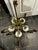 Elevate your space with this striking mid-century modern 5-light saucer-style chandelier. This fixture beautifully blends...