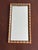 This faux bamboo mirror with its warm golden coloring and touch of red is wonderful for anyone who appreciates a touch of...