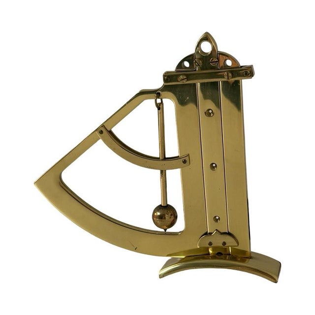 Goldplated, working, model of a Gunner’s Quadrant, mounted on a wooden base and marked at the underside of the wooden...