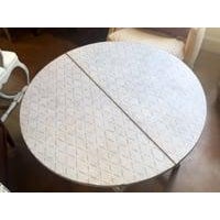 This elegant early 20th-century Swedish folding table is a perfect blend of simplicity, functionality, and timeless...