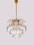 Very impressive 4 lights chandelier of excellent quality with long crystals on a gold plated frame. Manufactured by...
