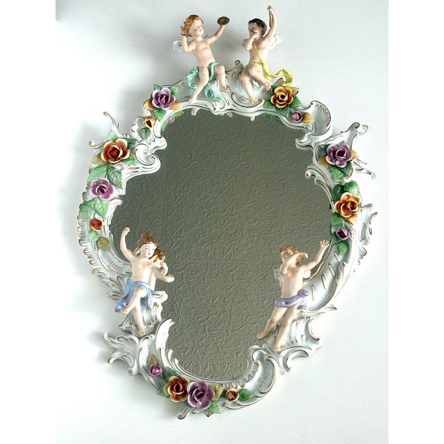 Baroque Style Putti Porcelain Mirror from PMP Plaue Schierholz, 1950s, in Very Good conditions. Designed 1950 to 1959 This...