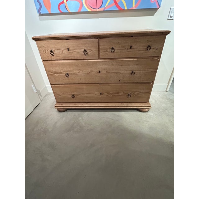 Beautiful large 19th century antique English natural pine chest of drawers having classic two-over-three configuration and...