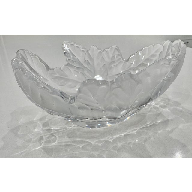 The Lalique France Crystal Oak Leaf Compiegne Bowl is a highly collectible, mid-century modern art glass piece designed by...