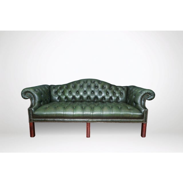 Transform your space with a timeless duo of vintage charm. This rare pair of button-tufted Chesterfield sofa and loveseat...