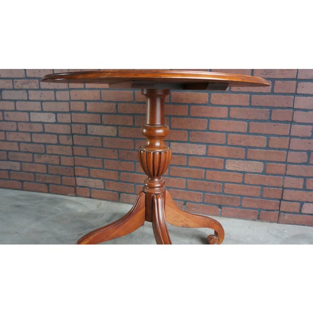 Traditional styling with a carved reeded urn pedestal base, grounded nicely by 4 elegantly curved legs. Finely crafted in...