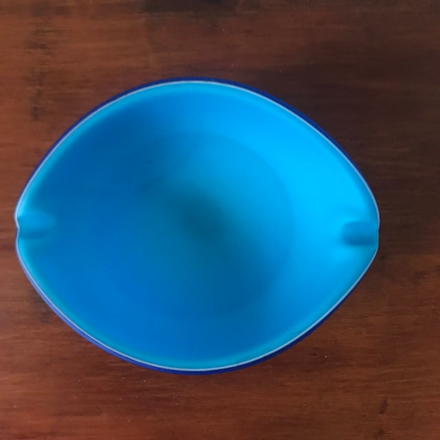 We love the colors and velvety frosted texture of this two-toned cased glass piece. It is the ideal size to make a...