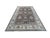 Afghan Oushak rug, hand-knotted in Afghanistan from 100% wool. Measuring 9’10” x 13’10”, the rug features an elegant...