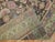 An attractive antique Karabagh rug. Herati pattern, chocolate brown colorfield with hints of lavender, chartreuse, pink...