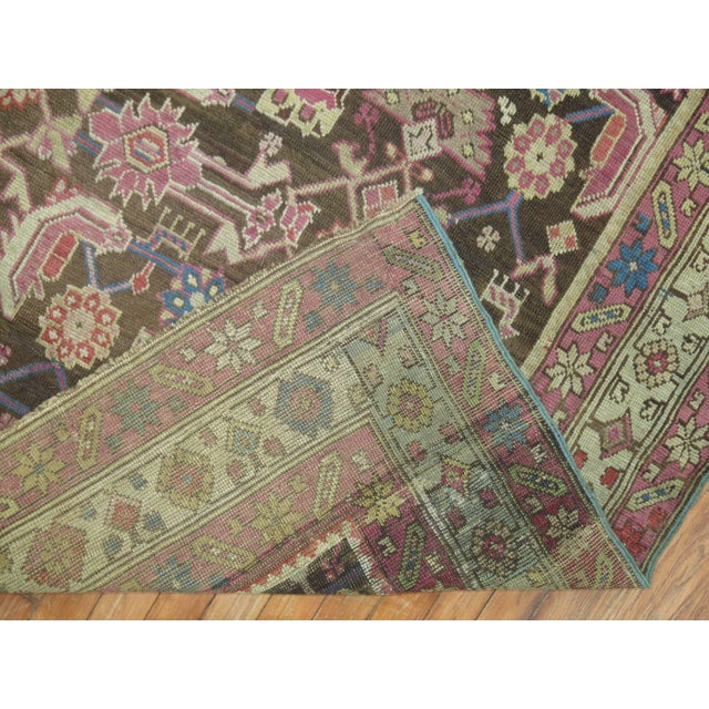 An attractive antique Karabagh rug. Herati pattern, chocolate brown colorfield with hints of lavender, chartreuse, pink...