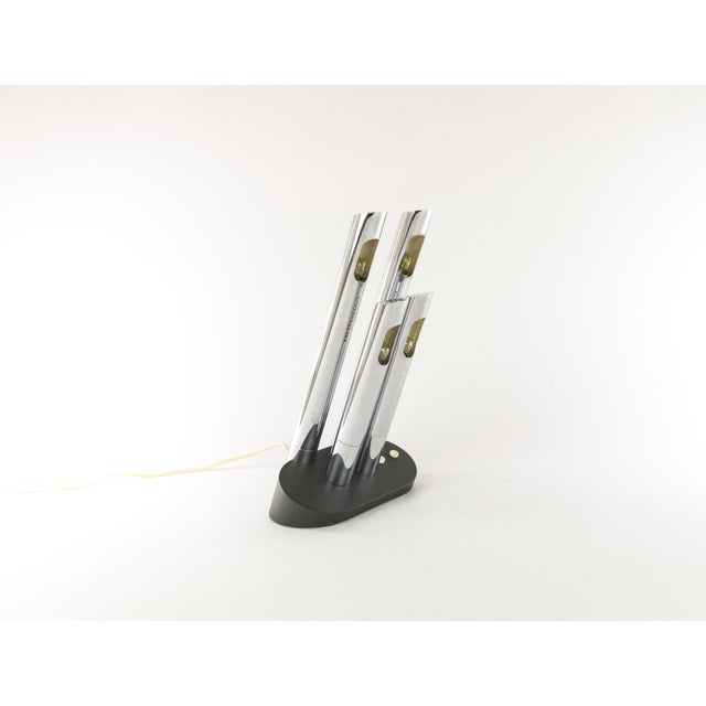 Model T443 table lamp in metal with four chromed tubes, designed by Mario Faggian for Italian manufacturer Luci...