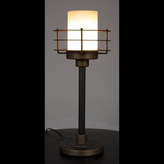 Illuminate your space with the elegant charm of this exquisite lamp, carefully crafted to exude timeless appeal. The...
