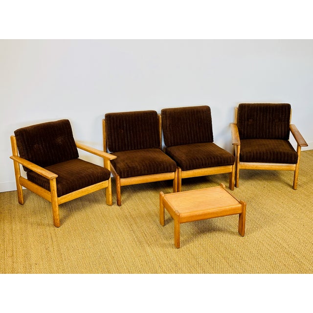 Complete modular scandinavian vintage living room set dating from the 1960s, comprising two armchairs and two armless...