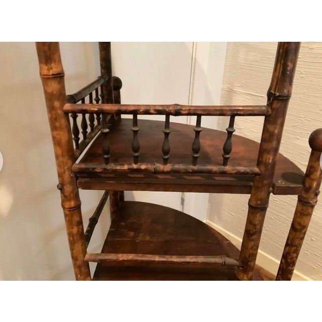 This is a 5-tiered scorched bamboo corner shelf with nice trim and all wood shelver. Excellent for a bedroom, bathroom or...