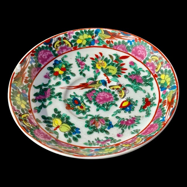 This matching pair of Chinese export porcelain plates features the classic Famille Rose, or Rose Medallion, pattern...