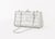 Judith Leiber Swarovski Crystal Covered Minaudiere, with optional silver-tone curb link chain strap, marked inside. 3.75"...