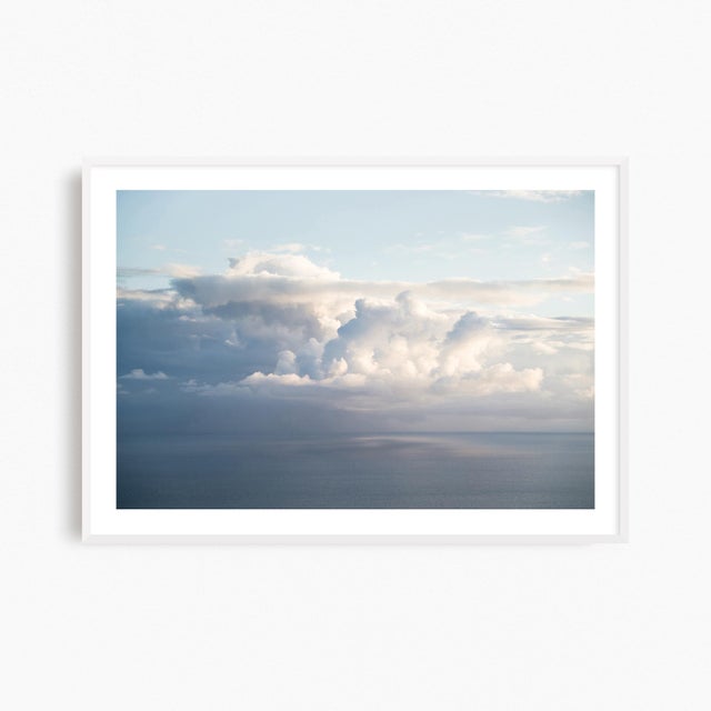 Storm clouds passing over the Ionian Sea is the subject of this seascape art photograph from Kefalonia, Greece. A fine art...
