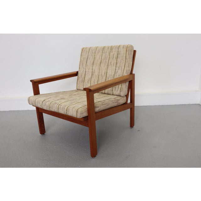 Scandinavian armchair model Capella by Illum Wikkelso for Niels Eilersen, Denmark. Base in very good condition, made of...