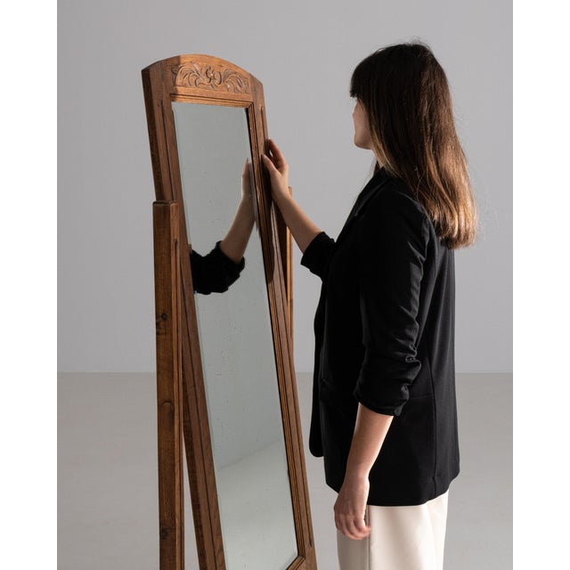 A cheval mirror whose natural oak frame, floor standing gives it real character at first glance. Originating in France...