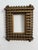 This frame is a work of art in itself. Painstakingly assembled using tiny pieces of wood, this masterpiece is one of a...