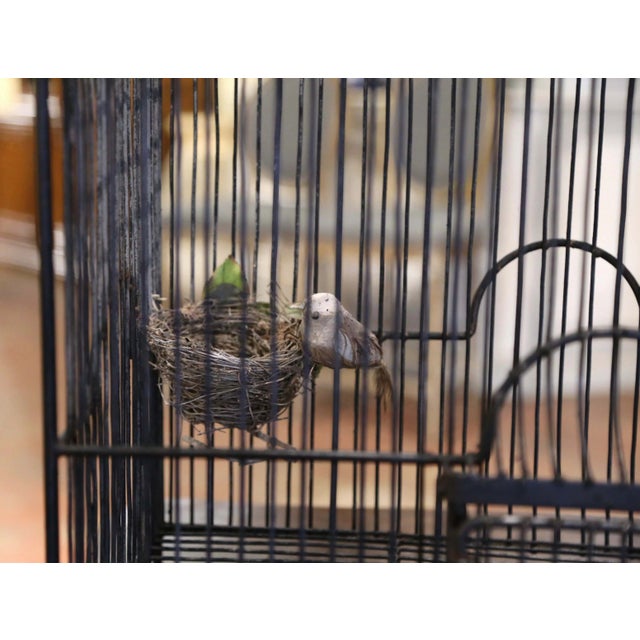 Bring the outdoors in with this large, elegant, antique birdcage. Crafted in France, circa 1880, this The birdcage...
