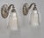 Hettier & Vincent A wonderful pair of 1925-1930 French art deco wall sconces in nickel plated bronze and clear frosted...