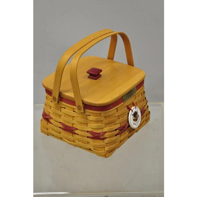 Vintage Longaberger Christmas Edition 2000 Edition Deck the Halls Basket w/ Lid. Item features a wooden lid, porcelain...