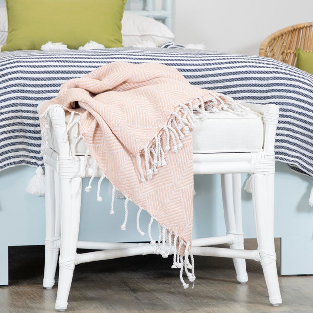 This beautifully designed bench from David Francis features a Rattan frame, leather-wrapped joints and a tight boxed seat...
