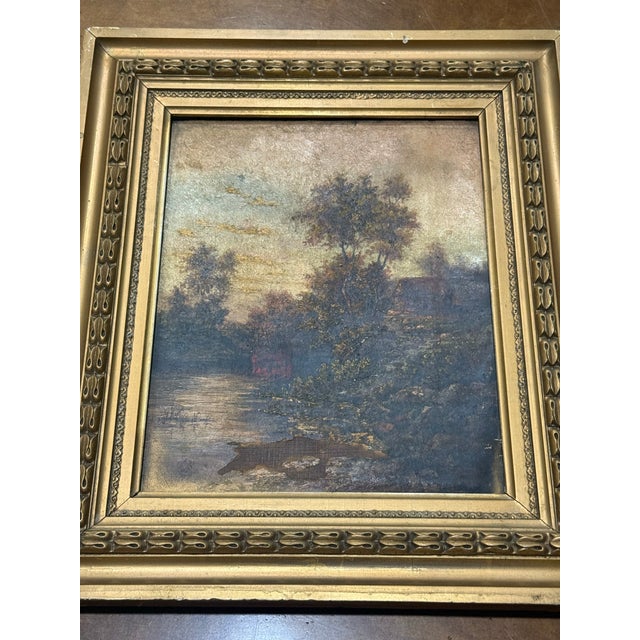 This atmospheric antique oil painting dates to the late 19th or early 20th century and reflects the tonal landscape...