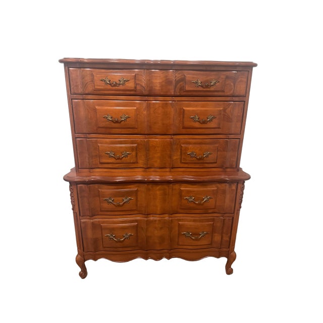 An elegant tallboy dresser likely by Broyhill or Caldwell, dating to circa 1960s. The only marking we have for these...