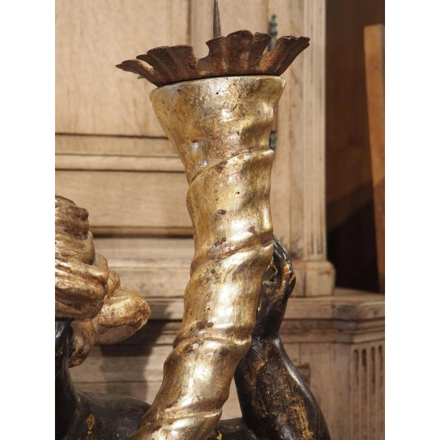 Standing at just under 4 feet high and hand-carved in Italy during the 1700’s, this fabulous pair of hand-painted and gilt...