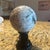 Bring organic elegance to your interior with this striking, hand-polished Rainbow Moonstone crystal sphere. Meticulously...