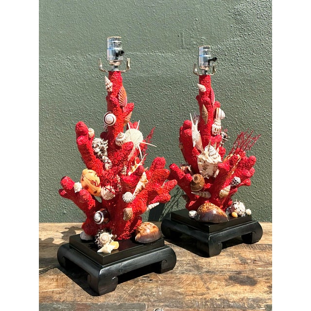 This vibrant pair of vintage table lamps is a quintessential expression of Hollywood Regency glamour with a maximalist...