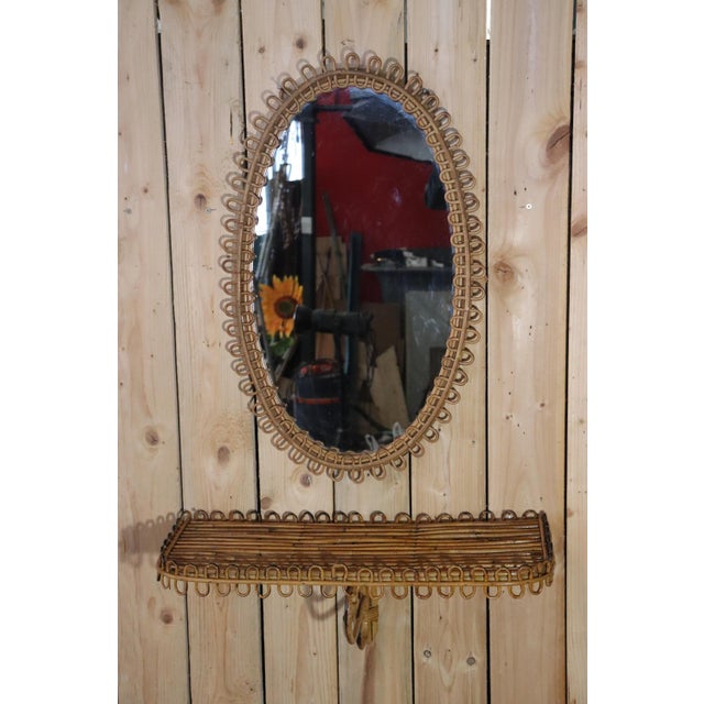 Rare italian-designed mirror and rattan stand set. franco albini bonacina style. circa 1950/60. excellent overall...