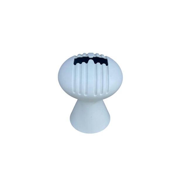 The vase is available in both white ceramic and cream/beige ceramic This piece has an attribution mark, I am sure that it...