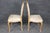 Enhance your dining room with the timeless elegance of this exquisite set of six French Louis XV style side chairs,...