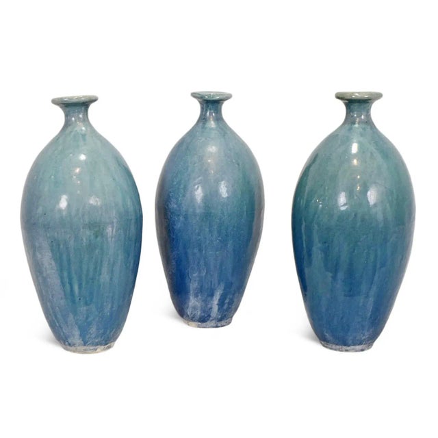 Enchanting powder blue hand thrown ceramic oblong vase with ring top. Charming old world village style. Wonderful...