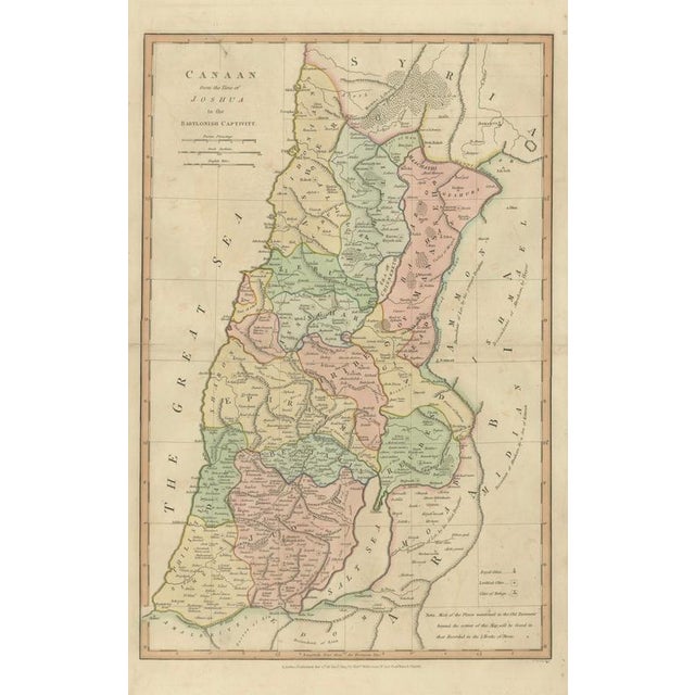 This finely engraved and delicately hand-colored biblical map titled “Canaan from the Time of Joshua to the Babylonish...