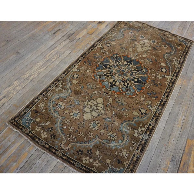 Early 20th Century Persian Tabriz Carpet 3' 2" x 5' 9" Tabriz is the seat of Persian Azerbaijan Province, a large...