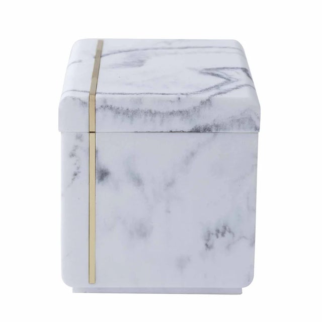 Crafted from sturdy resin and made to mimic marble, our Bergen Bath Accessories shine with its distinct off-centered brass...