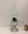 Precious antique electrified oil lamp from the early 20th century. The pressed glass lamp has an egg pattern and holds a...