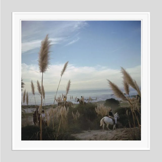 Pebble Beach' by Slim Aarons Open Edition Riders from the Pebble Beach Equestrian Center wend their way through the...