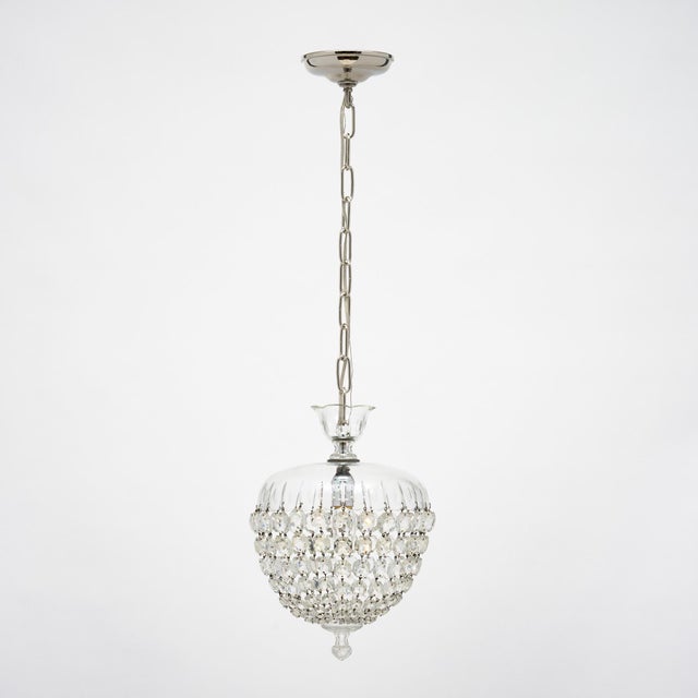 Pair of French pendant fixtures by Baccarat. These fixtures feature a hand engraved bell to which are attached a rich...