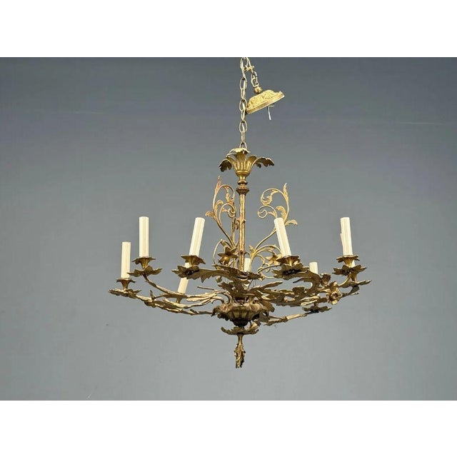 Rococo Style, Leaf and Vine Chandelier, Dore Bronze, Italy, 1920s A finely cast Dore Bronze Chandelier having nine lighted...