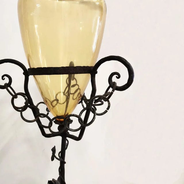 Umberto Bellotto and Giacomo Cappellin | Big straw glass vase | Support wrought iron | h cm. 110x34 | vase cm. 40 | about...