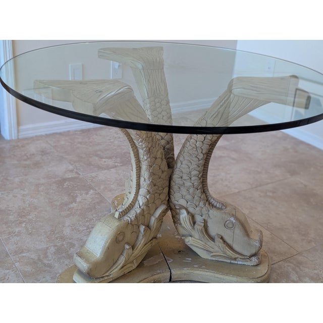 Vintage Hollywood Regency carved wood koi table circa early 1980's. Nice detailed wood carving and light patina finish....
